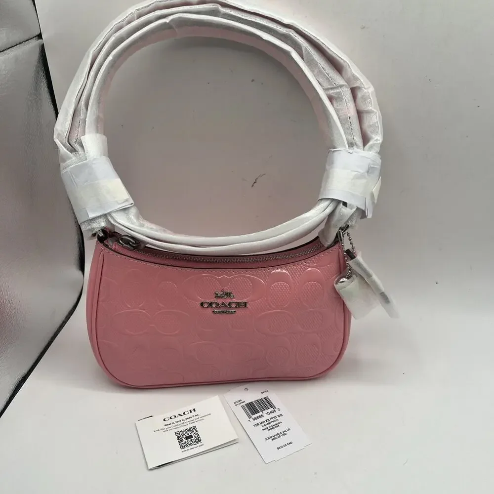 Coach Teri Mini Crossbody Bag Signature Patent Leather Heart Charm CCZ29 pink